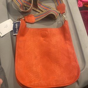 Adorned cross body orange bag
